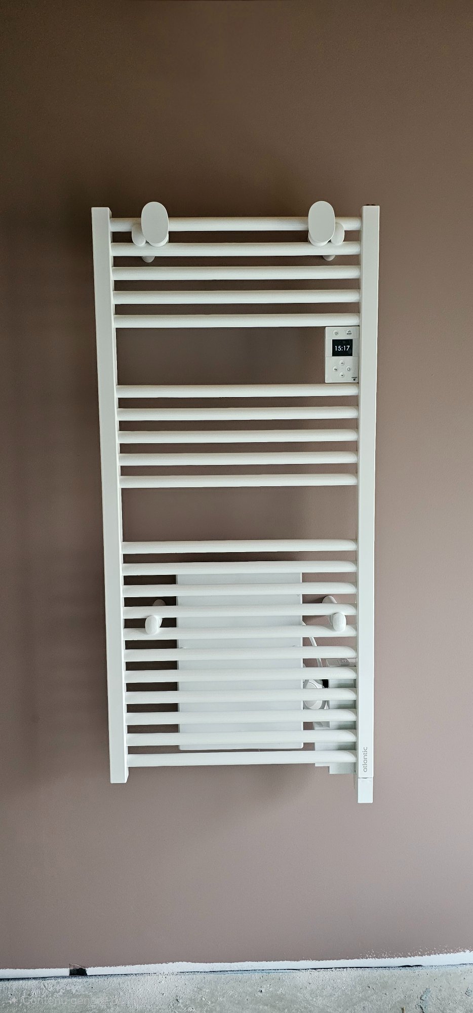 Sèche-serviette Atlantic à fluide caloporteur installé à Yenne